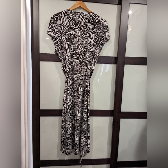 Figure flattering zebra stripe faux wrap dress. - Picture 2 of 5